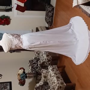 Wedding gown with blush pink heart-shaped top